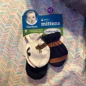 Never worn baby mittens